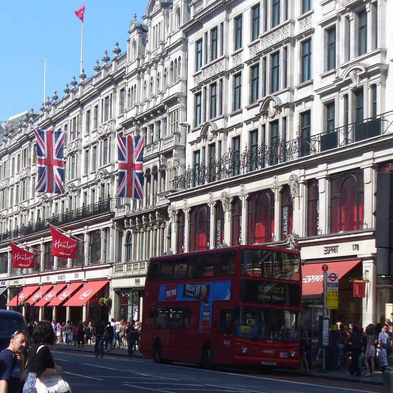 Shoppers and a red bus on Regent Street, London